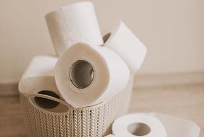 Rolls of toilet paper in a basket